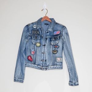 Blue denim jacket with patches